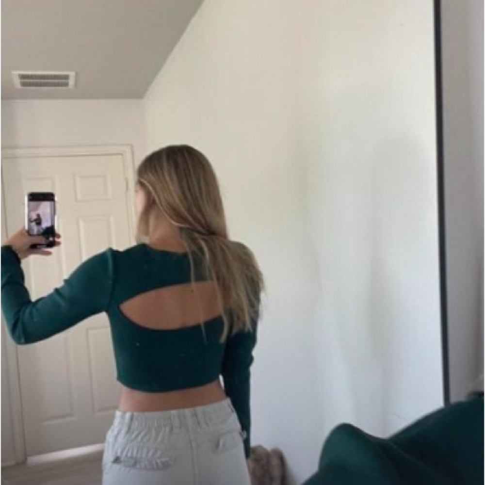 Open back green top